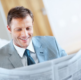 Man reading newspaper